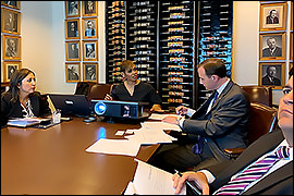 Secretary Whitley sitting at a table with U.S. Census representatives 