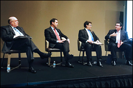 Secretary Pablos sitting with other panelists.